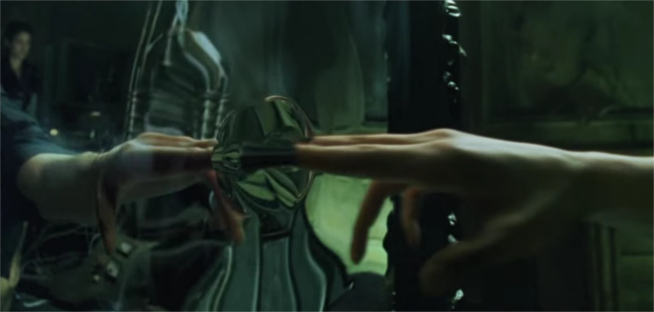 neo_touches_mirror_in_the_matrix